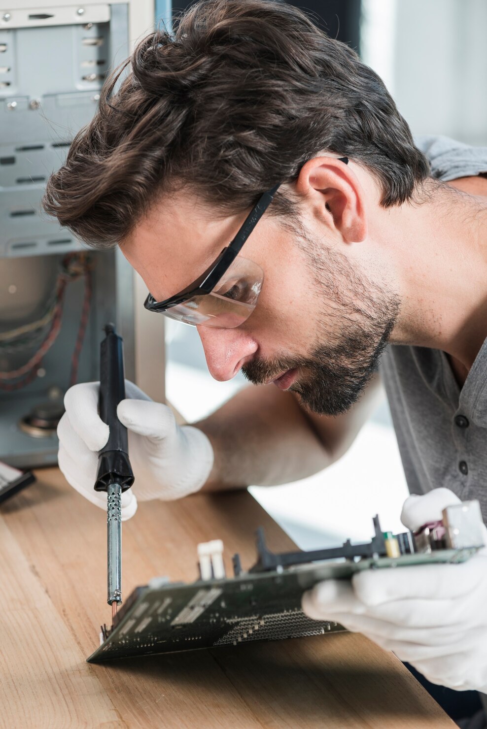 close up young male technician working computer motherboard 23 2147923492